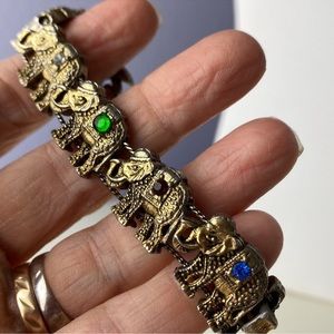 Floating elephant bracelet with rainbow rhinestones